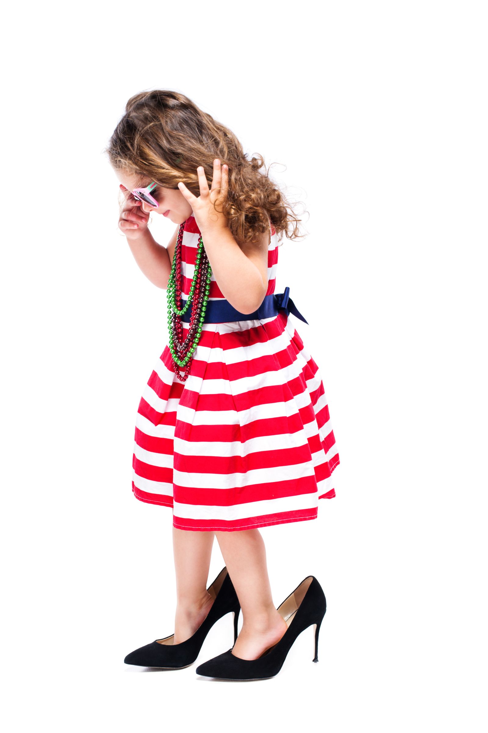 little girl wearing high heels