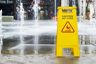 How A Wet Floor Sign Affects Your Slip And Fall Claim Neblett